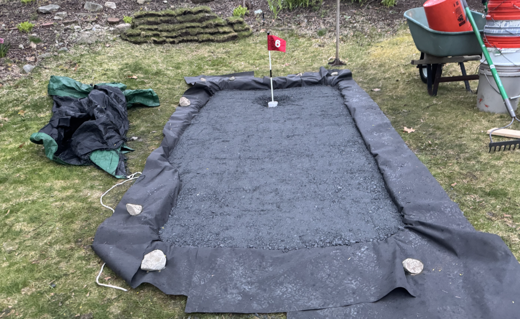 Add a crushed stone base with fine for your putting green base