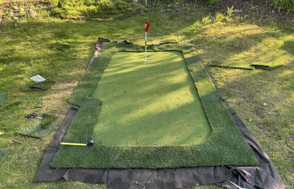 Add fringe to backyard putting green